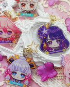 Cute keychains inspired by Genshin Impact characters in chibi style drawing. Best glitter keychains gift for Travelers and Hoyoverse fans.
