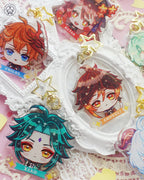 Cute keychains inspired by the game Genshin Impact Liyue characters in chibi style drawing. Best glitter keychain gift for Travelers and Hoyoverse fans.