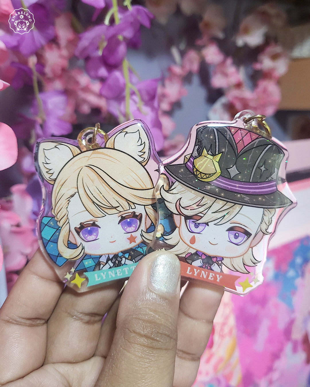 Cute keychains inspired by the game Genshin Impact Fontaine characters in chibi style drawing. Best glitter keychain gift for Travelers and Hoyoverse fans.