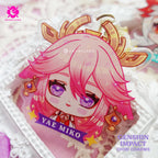 Cute keychains inspired by Inazuma Genshin Impact characters in chibi style drawing. Best glitter keychains gift for Travelers and Hoyoverse fans.